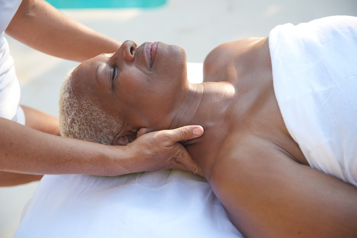 Woman receiving a neck massage